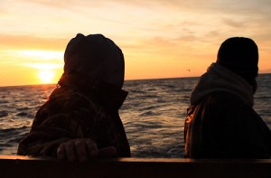 sunrise off the stern
